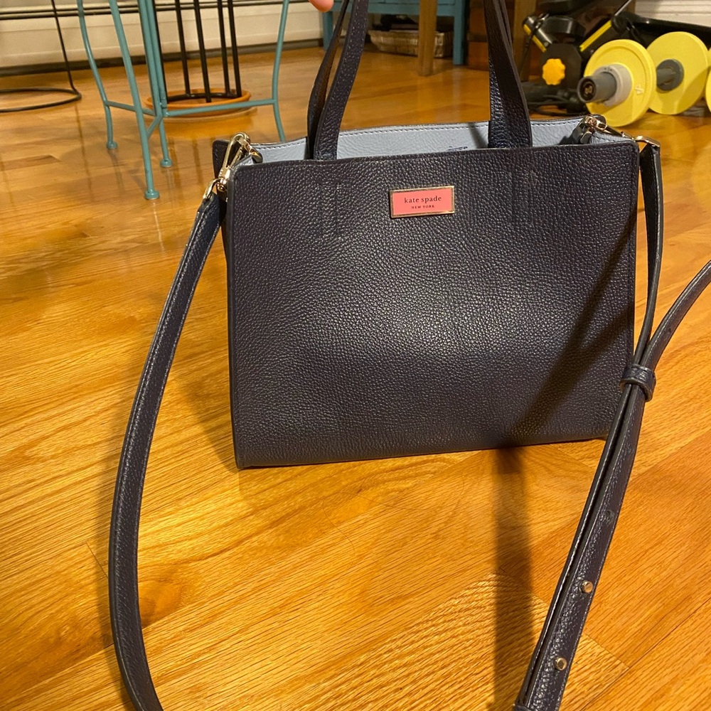 kate Spade navy cross body bag. Structured design  and an adjustable strap!